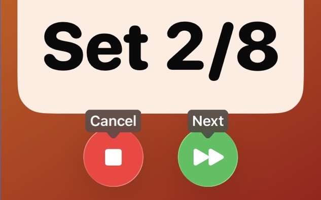Apple Watch showing 'Set 2 / 8' with Voice Control command labels 'Cancel' and 'Next' above the stop and skip buttons